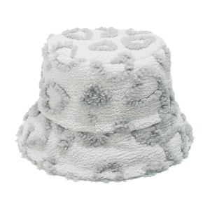 Detail of grey leopard print plush bucket hat with soft lamb wool texture for winter
