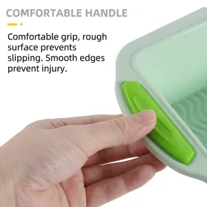 Green rectangular silicone toast mold featuring non-slip handles for comfortable grip