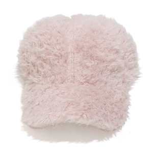 Close-up of soft pink plush baseball cap showing thick fluffy faux lamb wool texture
