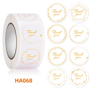 Detail showing 8 patterns of gold floral Thank You stickers on white adhesive roll