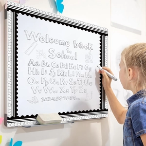 Decorative black wavy bulletin board border stickers for classroom whiteboards and displays