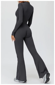 Detailed back view of slim fit yoga jumpsuit with flare leg and high collar