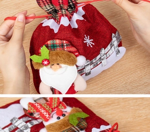 Close-up of Christmas drawstring gift bag featuring 3D Santa and Reindeer appliques