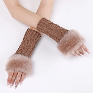 Detail of brown cable knit fingerless gloves with soft faux fur trim and warm texture