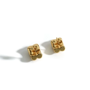 Elegant 18k gold geometric C-shaped hoop earrings with a stylish double circle design