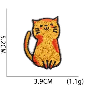Cute orange cartoon cat embroidery patch measuring 5.2cm by 3.9cm for clothing repair