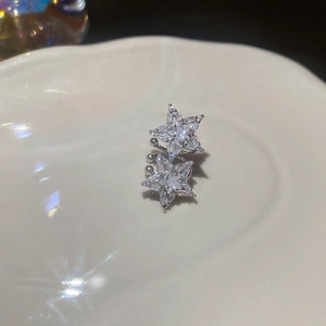 Detail shot of silver double star ear cuff with sparkling pavé cubic zirconia inlay