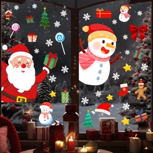Detail showing Santa Claus and snowman static stickers on a festive window display