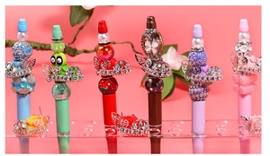 Colorful DIY beadable pens featuring miniature shoe charms and rhinestone accents