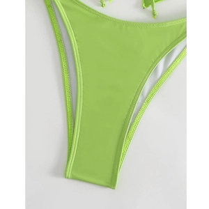 Detail of neon green bikini bottom showing reinforced stitching and side tie strings