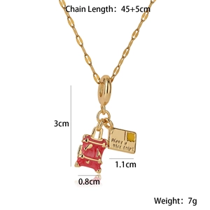 Detail showing dimensions of gold necklace with red backpack pendant and engraved tag