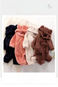 Detailed view of plush hooded baby rompers with bear ears in four assorted colors