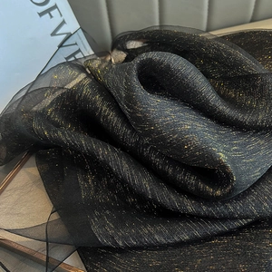 Elegant black double-layer silk scarf with shimmering gold metallic thread detail