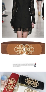 Detail of wide elastic belts featuring a golden floral buckle and multi-color options