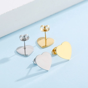 Chic heart-shaped stud earrings in gold and silver finish with white shell inlay for women