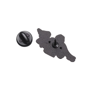 Detail of matte black pin back with granular texture and black rubber clutch backings