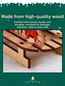 Close-up of DIY wooden Christmas sleigh with painted red dots and laser-cut edges