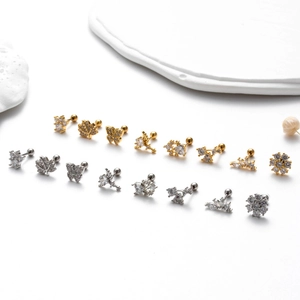 Detailed set of gold and silver stainless steel earrings with butterfly and leaf zircon studs