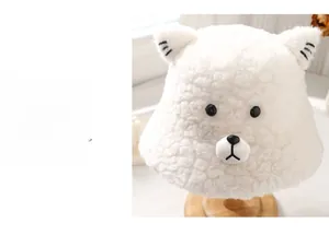 Detail of soft white faux lamb wool winter bucket hat featuring cute teddy bear ears