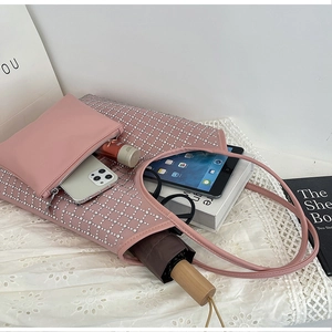 Detailed view of pink tote bag with silver rhinestones and matching zipper pouch