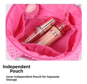 Pink quilted makeup bag interior featuring elastic side pockets for skincare storage