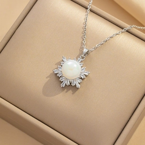 Silver snowflake pearl pendant necklace with sparkling cubic zirconia in a gift box
