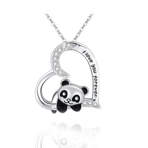 Macro view of heart-shaped panda pendant with I love you forever engraving and crystal accents