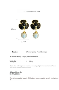 Detail view of black vintage floral pearl earrings with specific size and material dimensions