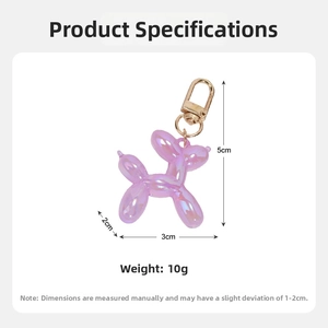 Detailed view of iridescent purple balloon dog keychain with 5x3x2cm size specifications