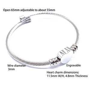 Polished stainless steel wire rope bangle with adjustable heart charm for custom engraving
