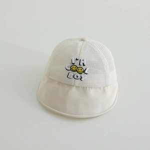 Detail of breathable mesh fabric and 'I'M COOL BOY' smile embroidery on a kids sun hat