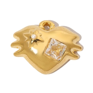 Detail view of heart-shaped gold pendant with square zircon and star-set pearl accent
