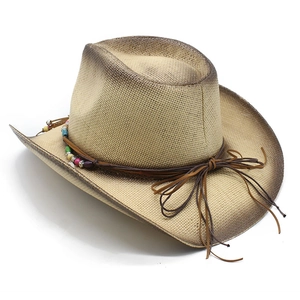 Close-up of woven straw cowboy hat with colorful beads and vintage smoked edge detail