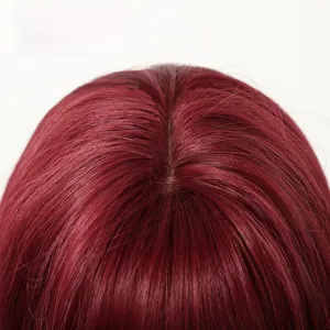 Close-up of the realistic scalp parting on a burgundy synthetic long hair wig