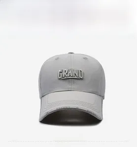 Detail of light grey quick-dry sports cap featuring GRAND 3D embroidery and RSPORT logo
