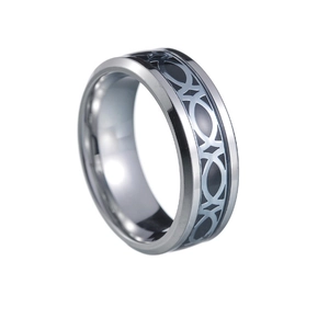 Detailed macro view of 8mm wide silver steel ring with black Celtic knot pattern