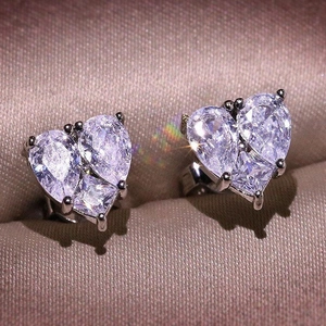 Sparkling heart-shaped cubic zirconia stud earrings with silver-toned settings