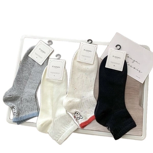 Women's cotton crew socks with puppy embroidery in gray, white, and black colors