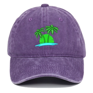 Close-up of purple washed cotton baseball cap featuring green coconut tree embroidery