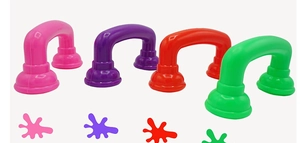 Detailed view of colorful plastic toy telephone handsets in pink purple red and green colors