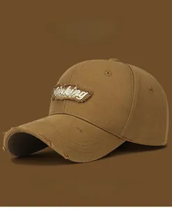 Detail of distressed cotton baseball cap with Thinking WISHFUL patch and frayed edges