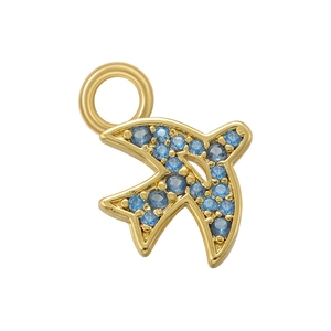 Detailed close-up of a golden swallow pendant inlaid with sparkling blue zircon stones