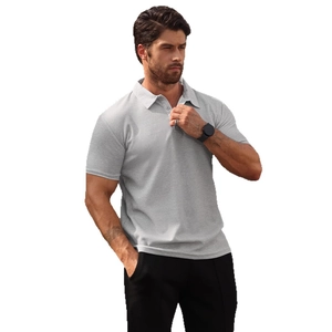 Men's grey waffle knit polo shirt with short sleeves and buttoned lapel collar
