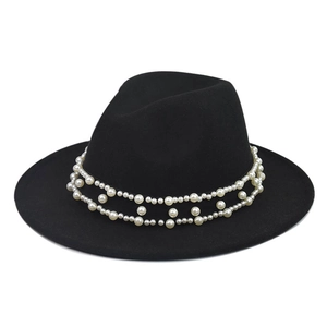 Detail of black wool fedora hat featuring an elegant double-row pearl decorative band