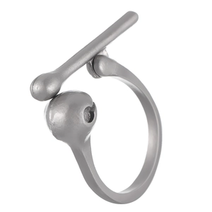 Macro shot of minimalist silver open ring featuring a geometric sphere and bar design