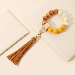 Wooden bead wristlet keychain with brown leather tassel and gold metal ring for women
