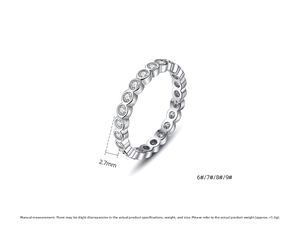 Detail view of 2.7mm width silver eternity ring with round-cut cubic zirconia stones