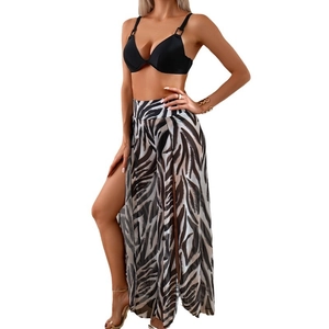 Three-piece bikini set with black top and high-slit zebra print cover-up trousers
