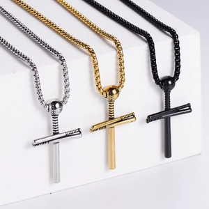 Detailed macro view of baseball bat cross necklaces in silver, gold, and black steel