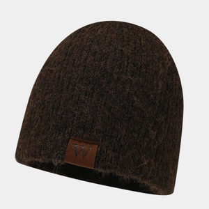 Detail of dark brown mohair knit beanie featuring a premium leather logo patch